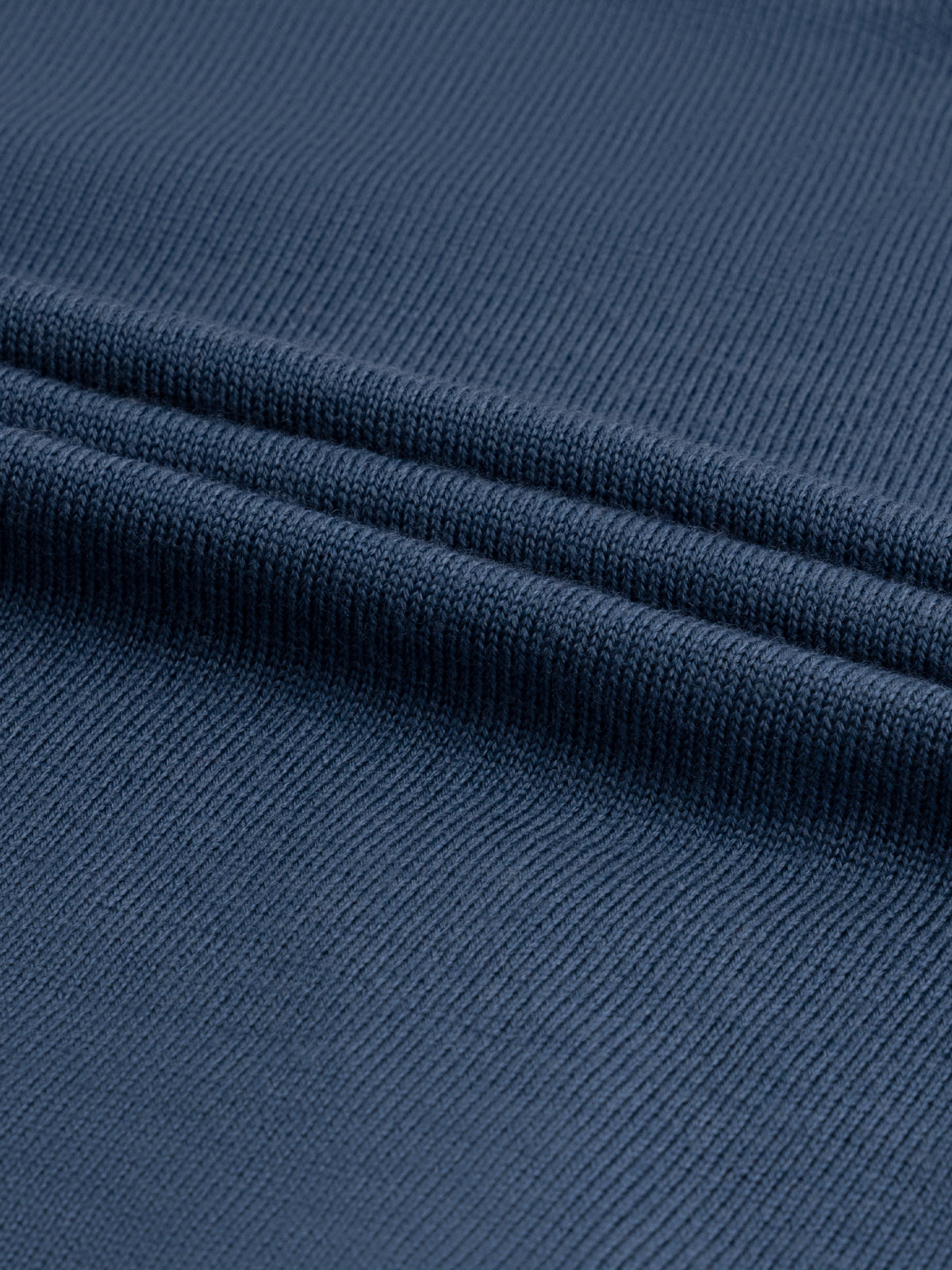 Merino Strickpolo Stahlblau