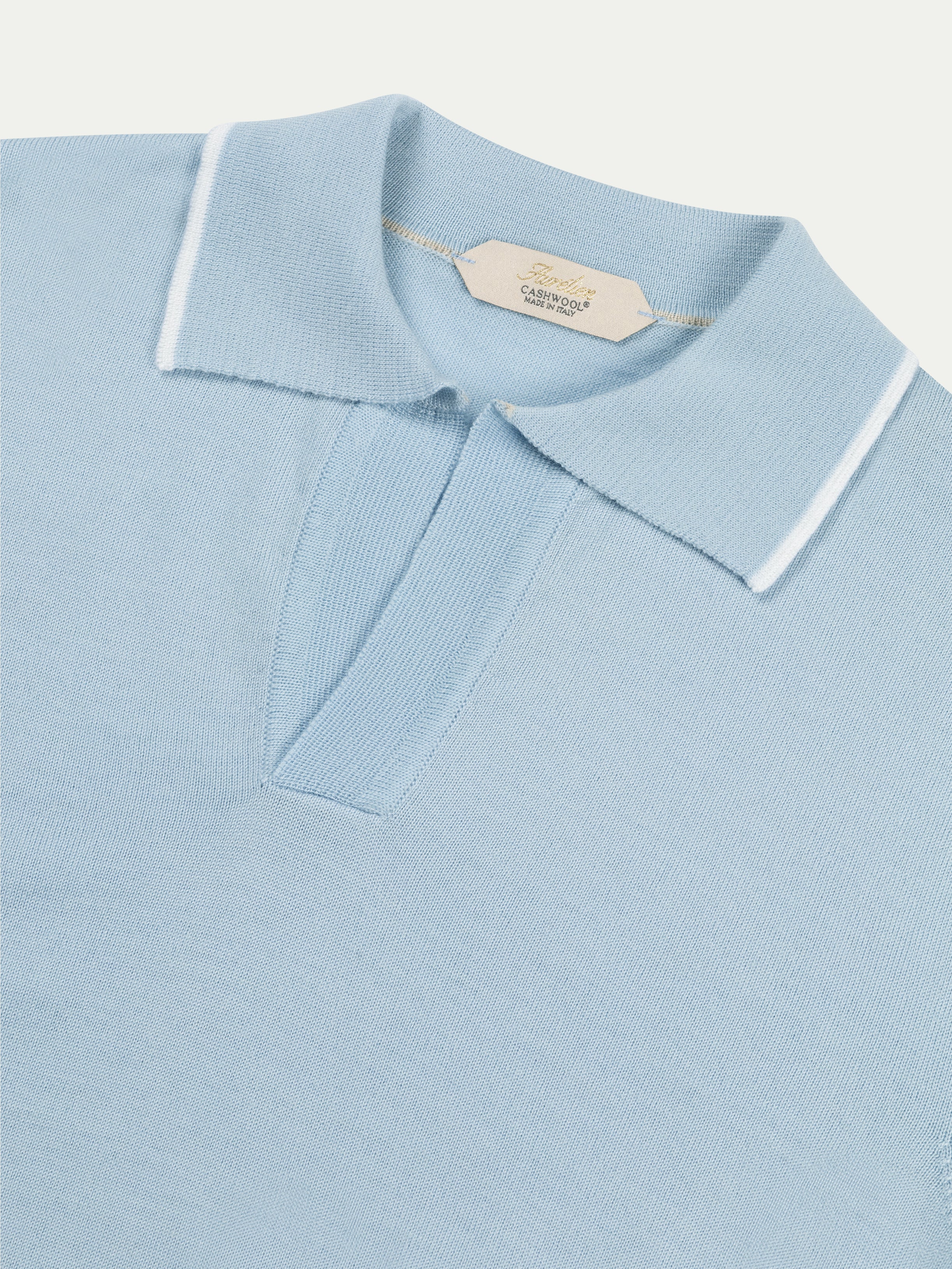 Light Blue Shortsleeve Buttonless Polo White Trim